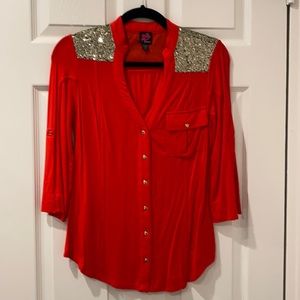 Red blouse with sequins